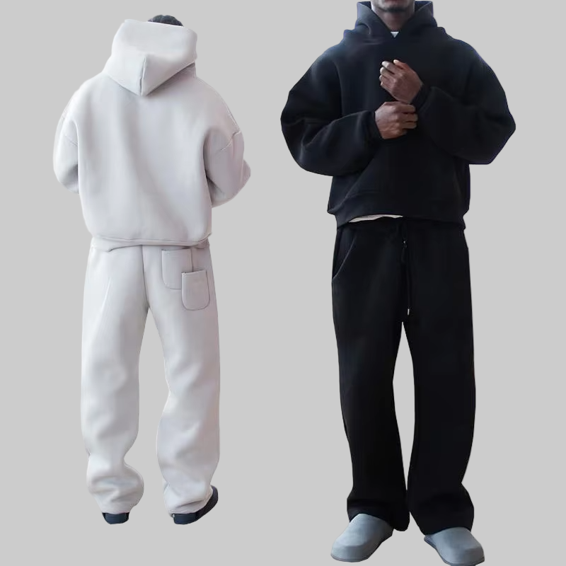 Chándal de hombre de talla grande con sudadera con capucha y pantalones jogger en blanco y negro.